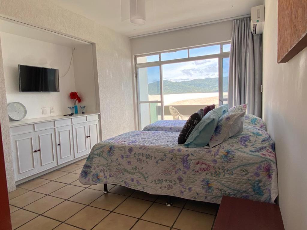 Pousada Das Dunas Via Praia Apart Hotel Florianópolis Rum bild